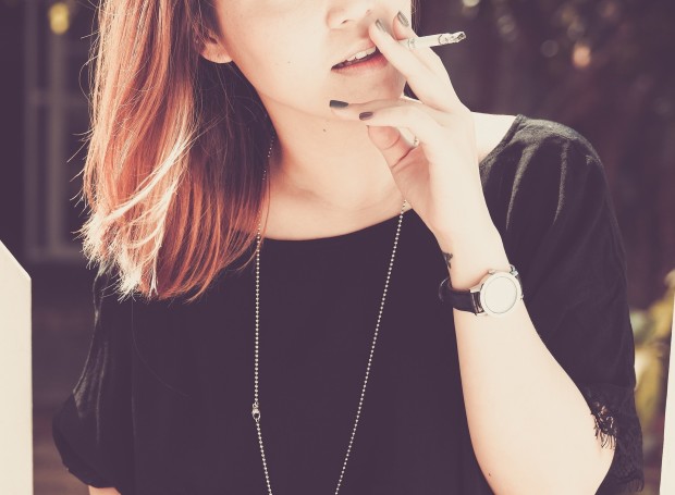 woman smoking cigarette