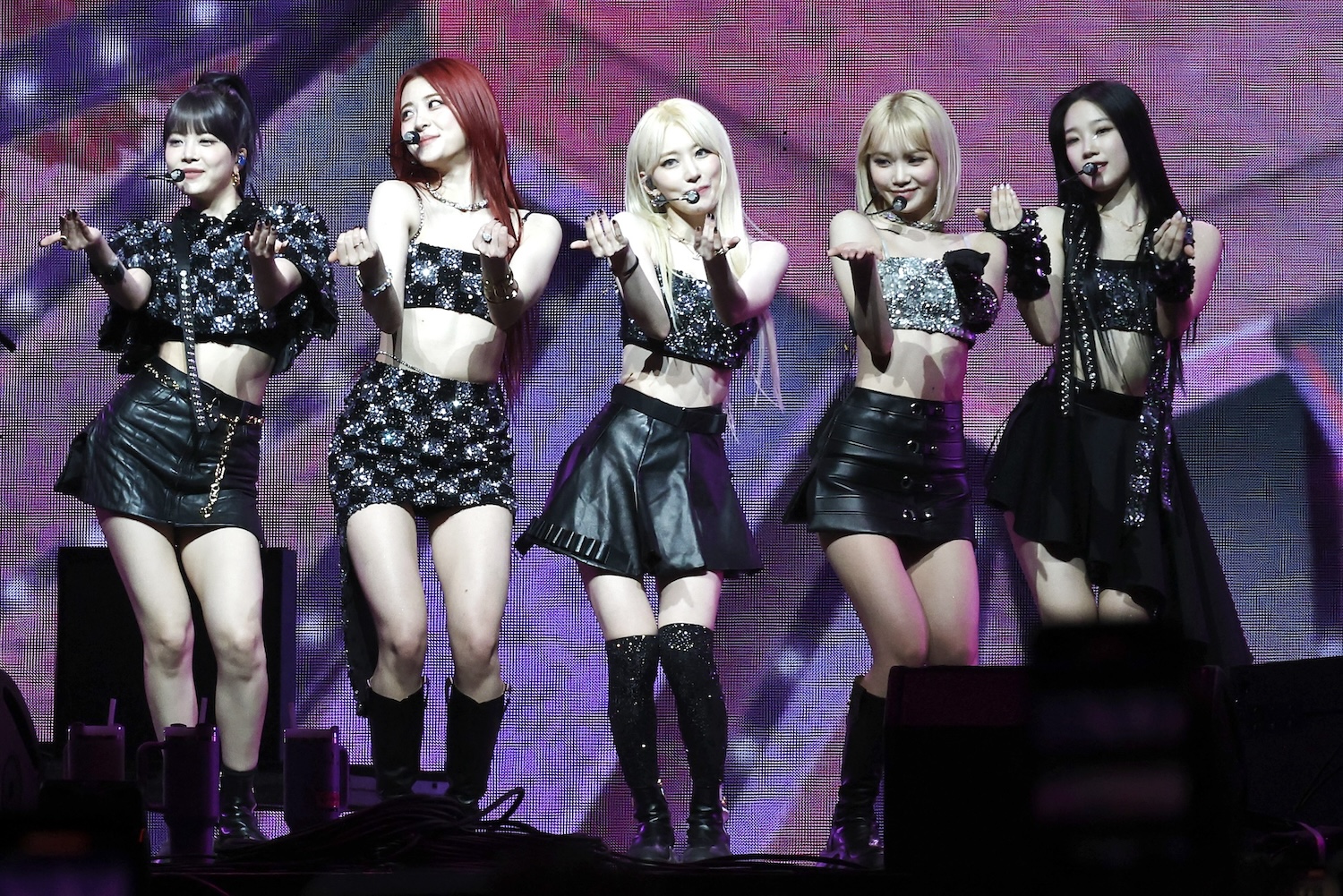 Hong Eun-chae, Huh Yun-jin, Sakura Miyawaki, Kim Chae-won, and Kazuha of Le Sserafim perform at the Sahara Tent during the 2024 Coachella Valley Music and Arts Festival at Empire Polo Club on April 13, 2024 in Indio, California
